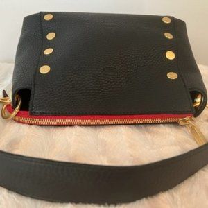 Hammitt Bryant (medium) in black with red lining along zipper and interior.
